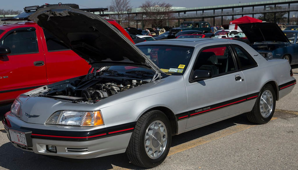 1987 Ford Thunderbird Turbo Coupe. Photo: Mr. Choppers. https://en.wikipedia.org/wiki/Ford_Thunderbird_(ninth_generation)#/media/File:1987_Ford_Thunderbird_Turbo_Coupe_at_Belmont,_front_left.jpg